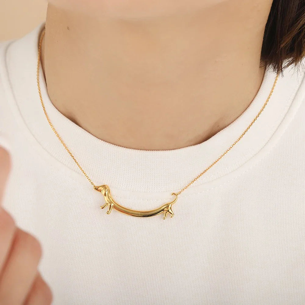 Golden Sausage dog Paw Necklace