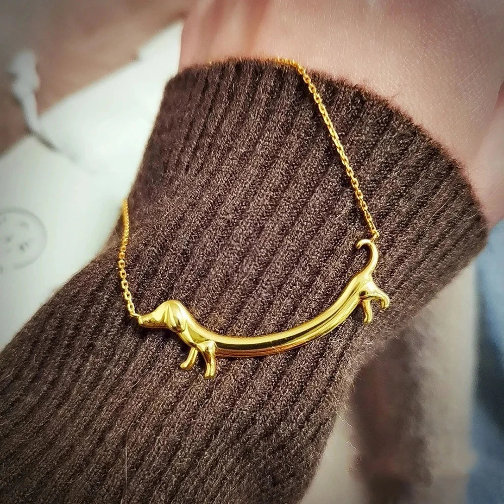 Golden Sausage dog Paw Necklace