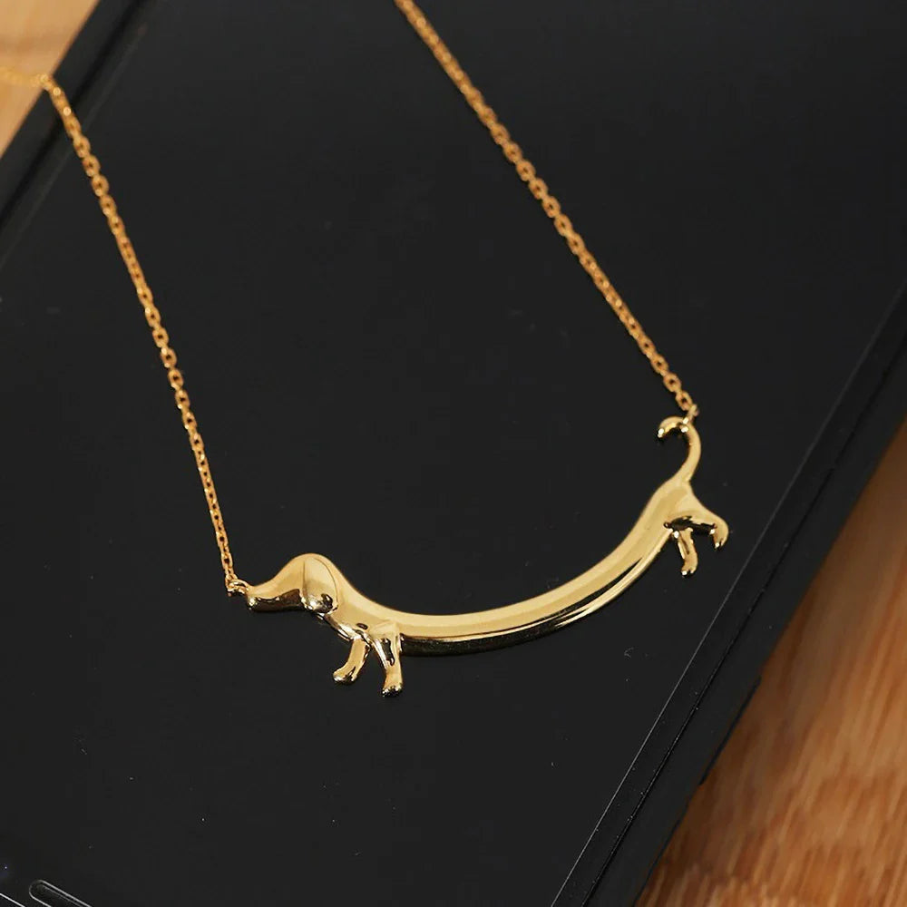 Golden Sausage dog Paw Necklace
