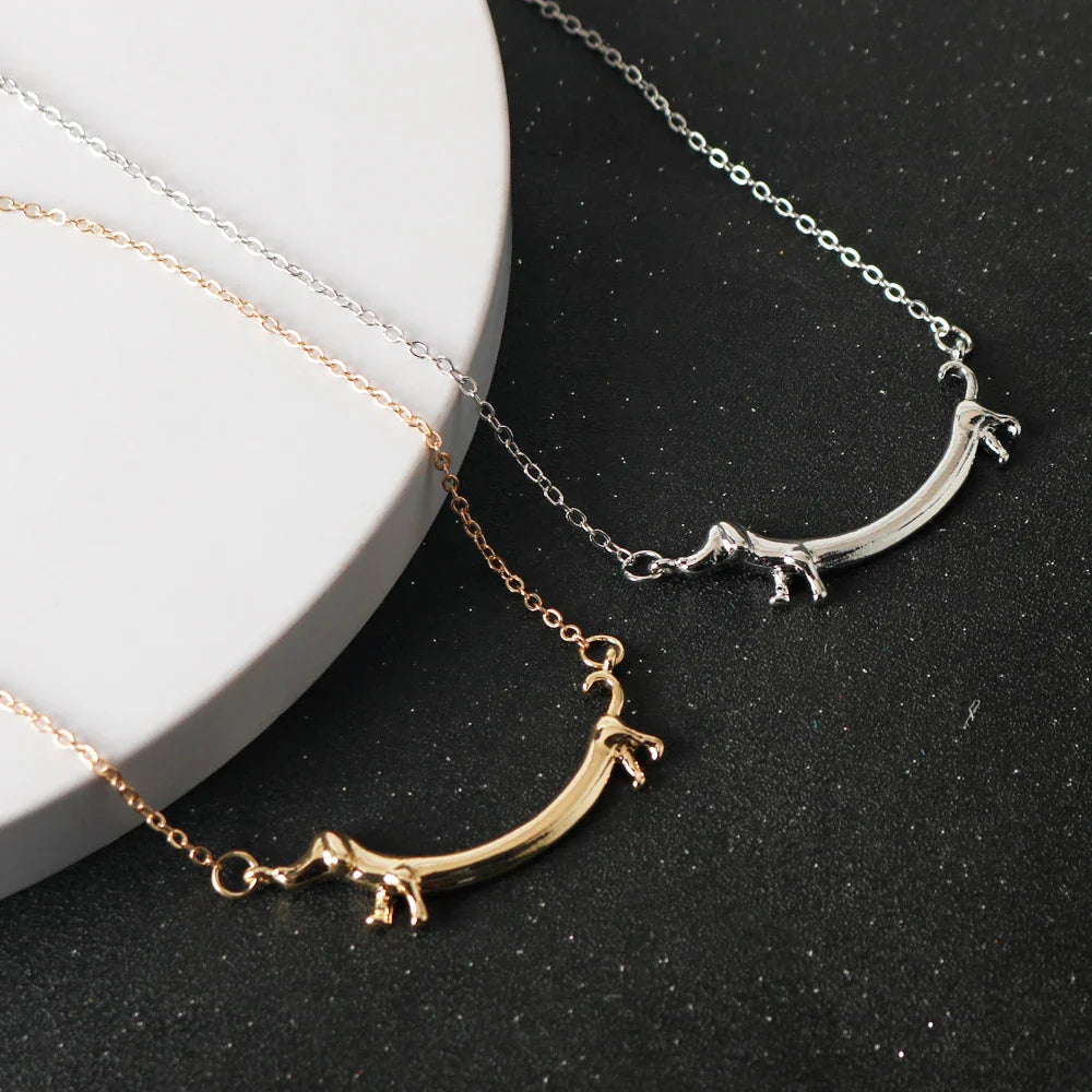 Golden Sausage dog Paw Necklace